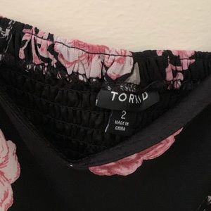 Flowered dress. Longer in back